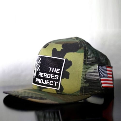 camo hat with The Heroes Project embroidered logo